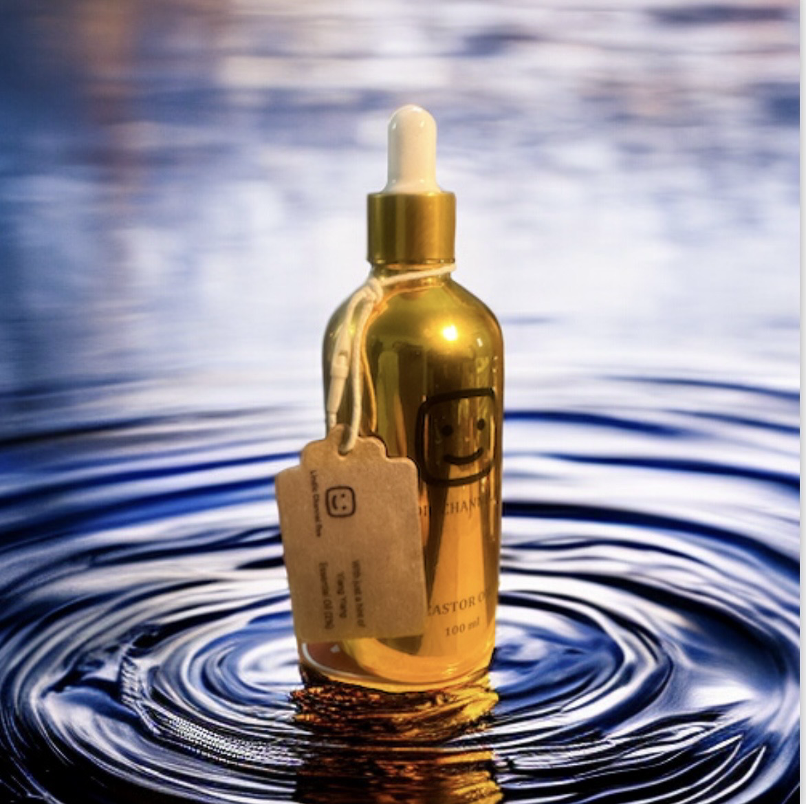 Castor Oil , hint of Ylang Ylang Essential Oil