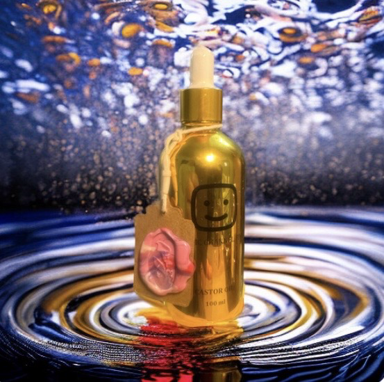 Castor Oil , hint of Ylang Ylang Essential Oil